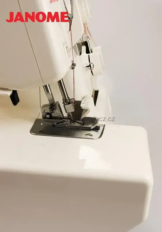 overlock JANOME 990D + 4 patky a vodič