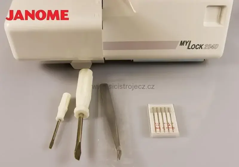 overlock JANOME 990D + 4 patky a vodič